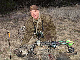 Jim Browning gets a big hog on the ranch in the spring of 2007.